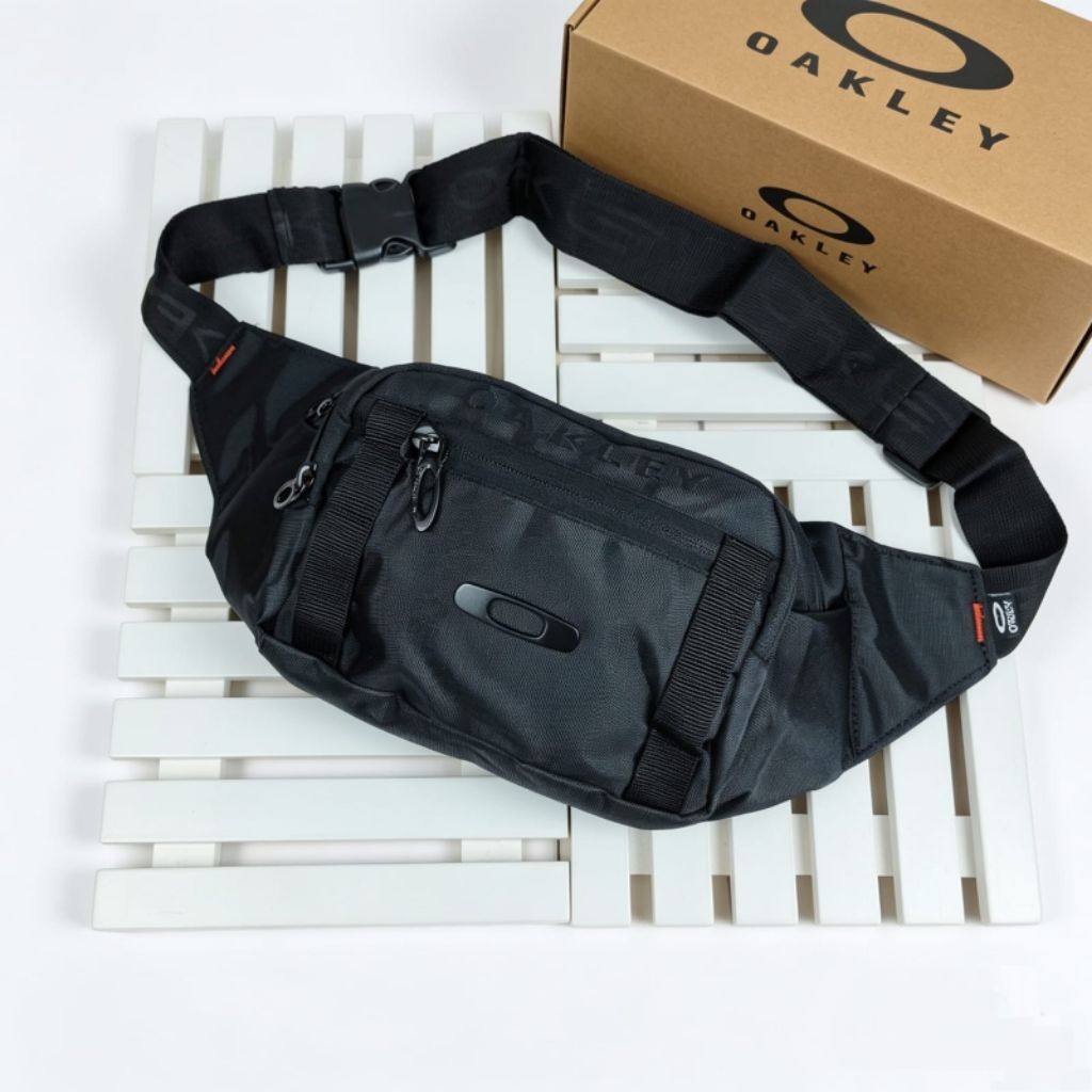 TAS OAKLEY TAS SELEMPANG OAKLEY WAISTBAG OAKLEY TAS PINGGANG OAKLEY SLINGBAG OAKLEY LOGO BESI