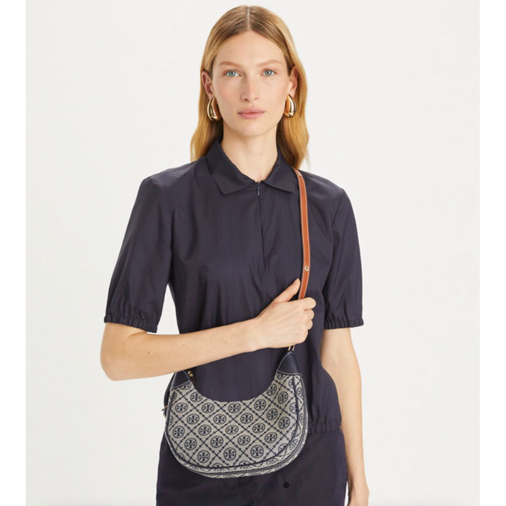 T MONOGRAM CRESCENT BAG