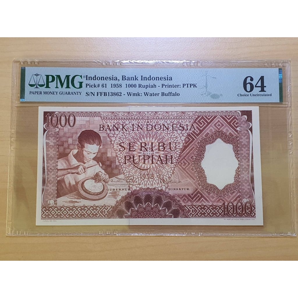 Duit Lama 1000 Pekerja PMG skor 64
