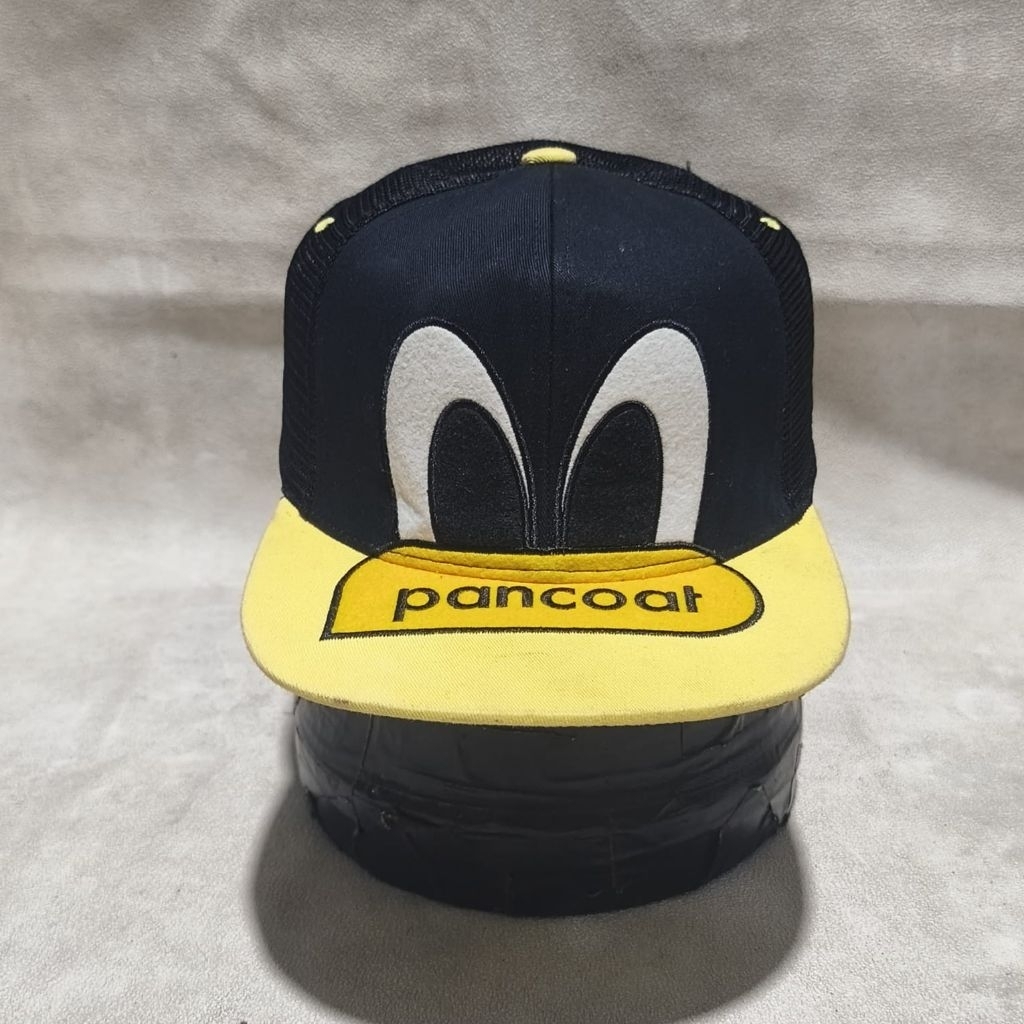 Topi trucker pria pancoat duck hitam kuning