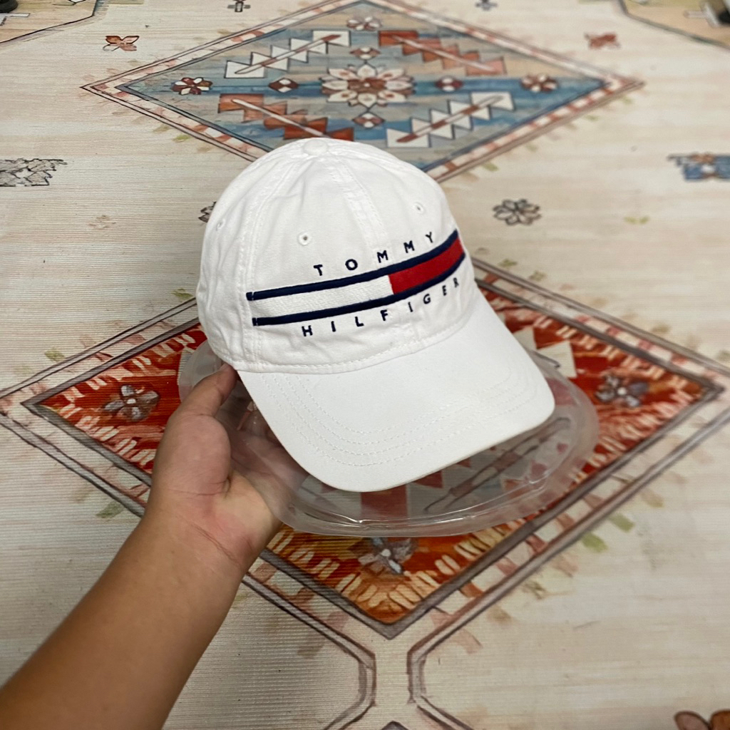 topi tom Big logo
