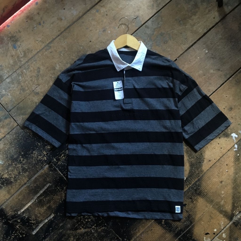 Polo rugby GU by Uniklo size L over seken otentik