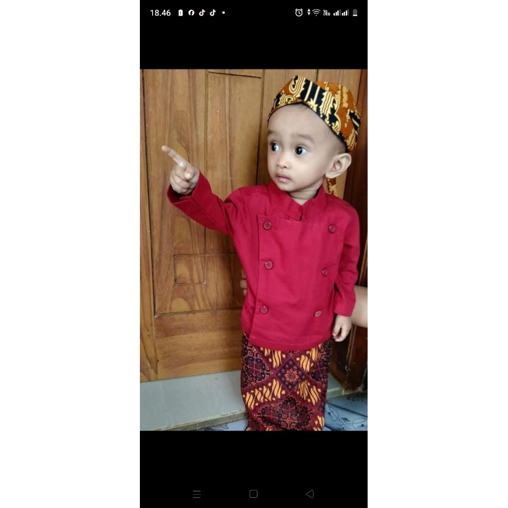 setelan baju dalang