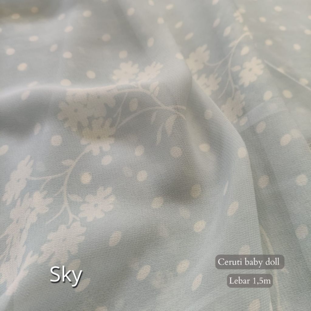 Sky kain Ceruti baby doll warna baby blue.