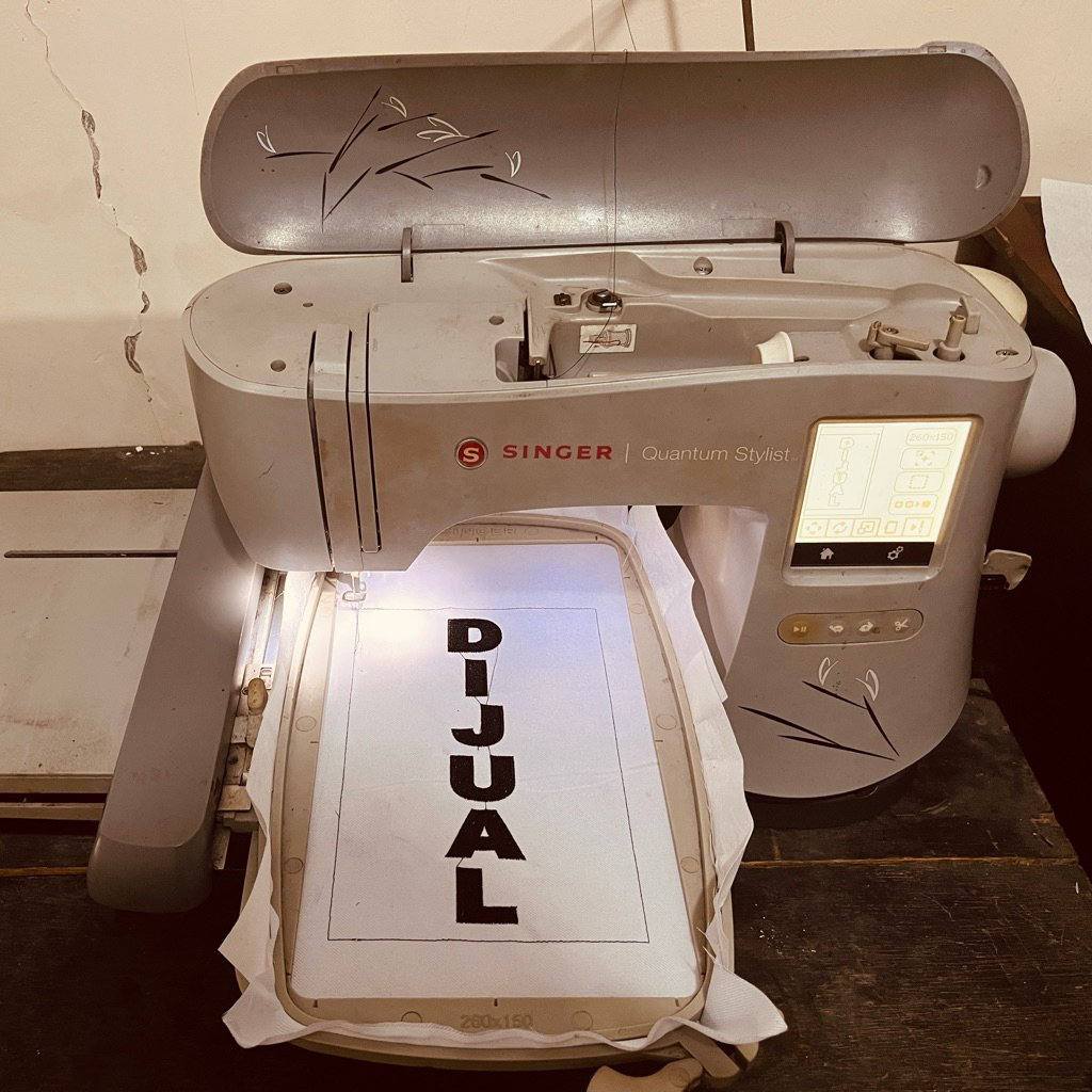 Singer EM 200 mesin bordir komputer portable