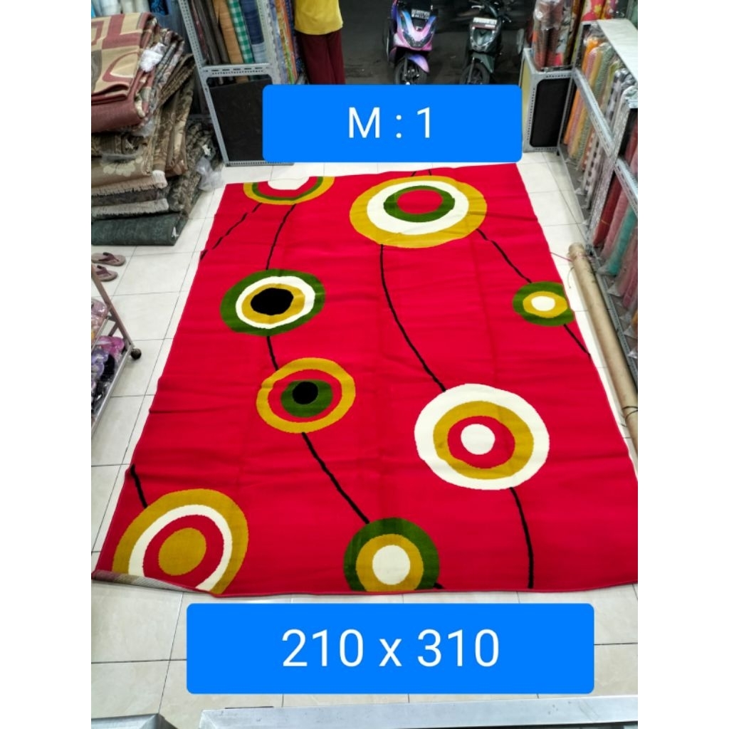 Karpet permadani motif abstrak