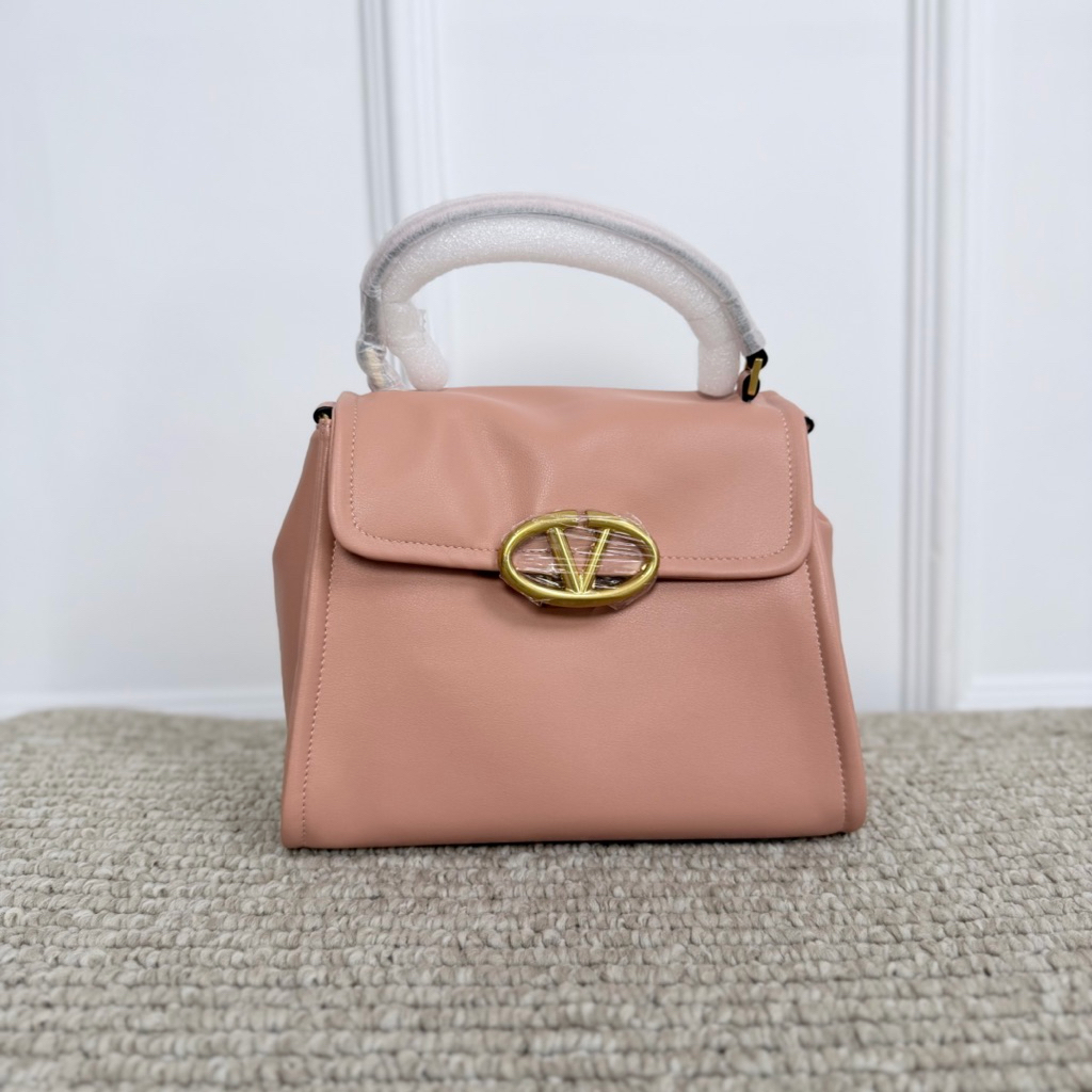 Ready - small V Sling ft prominent VLogo signature clasp Pink