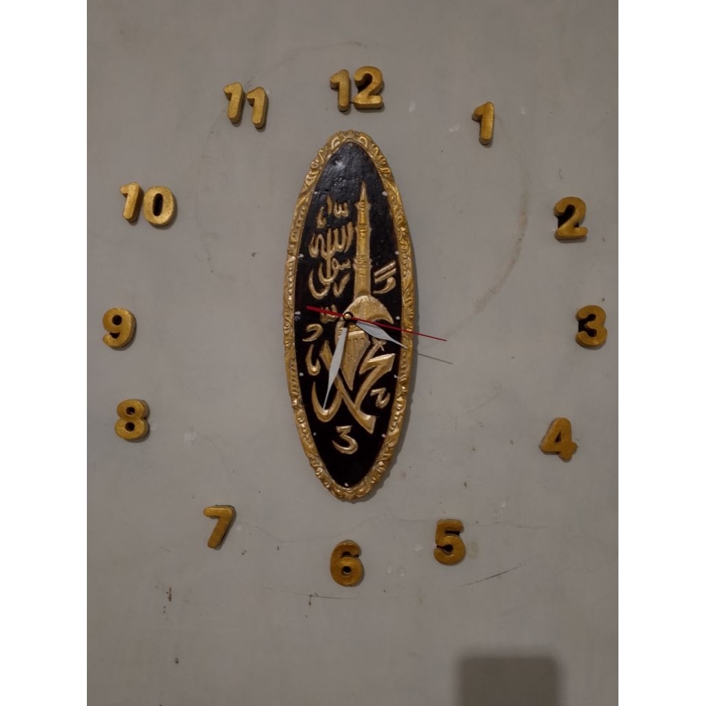 jam dinding tempel kaligrafi ukir 3D