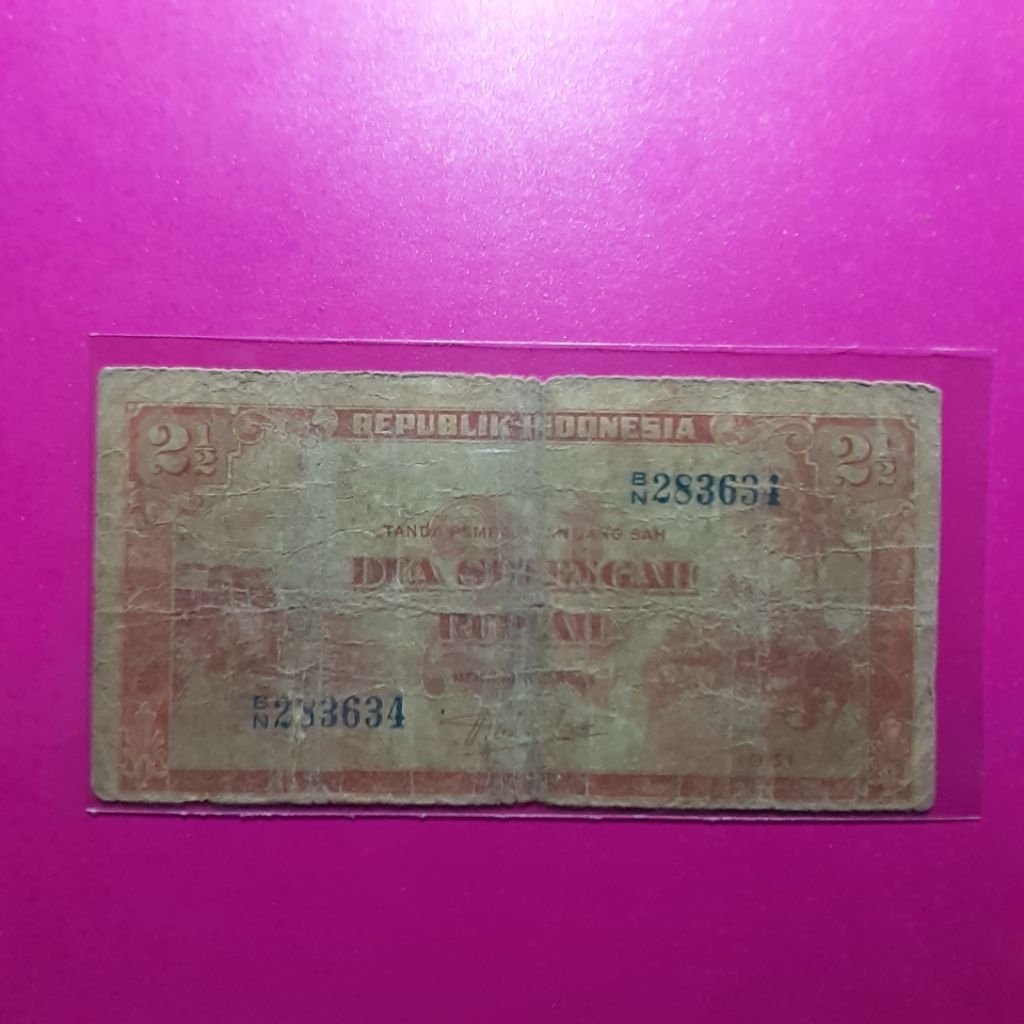 uang kuno 2,5 rupiah pemandangan