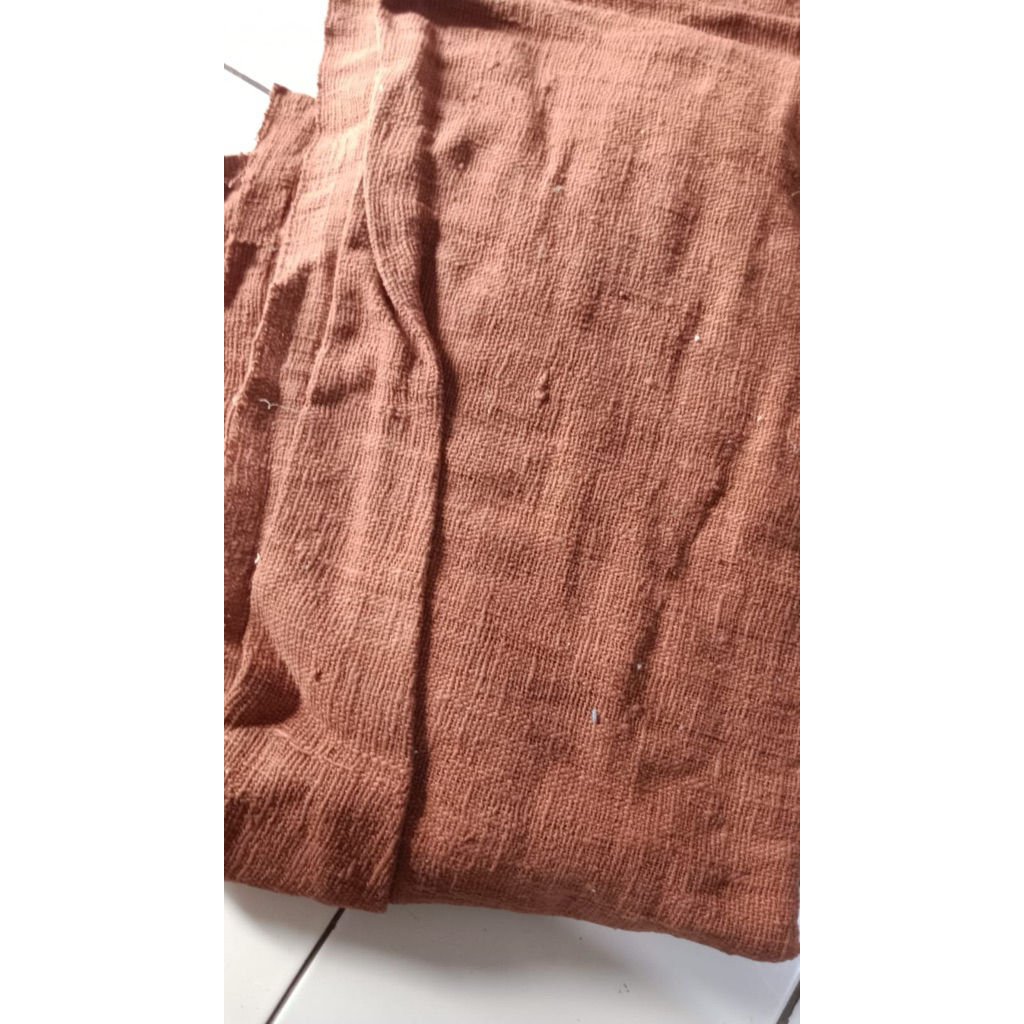 Kain Tumanggal Coklat