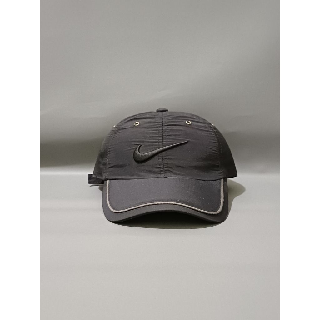 topi nike running second