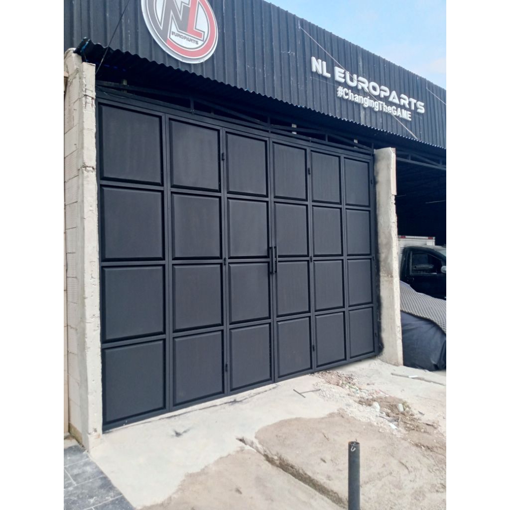 pintu lipat besi ruko