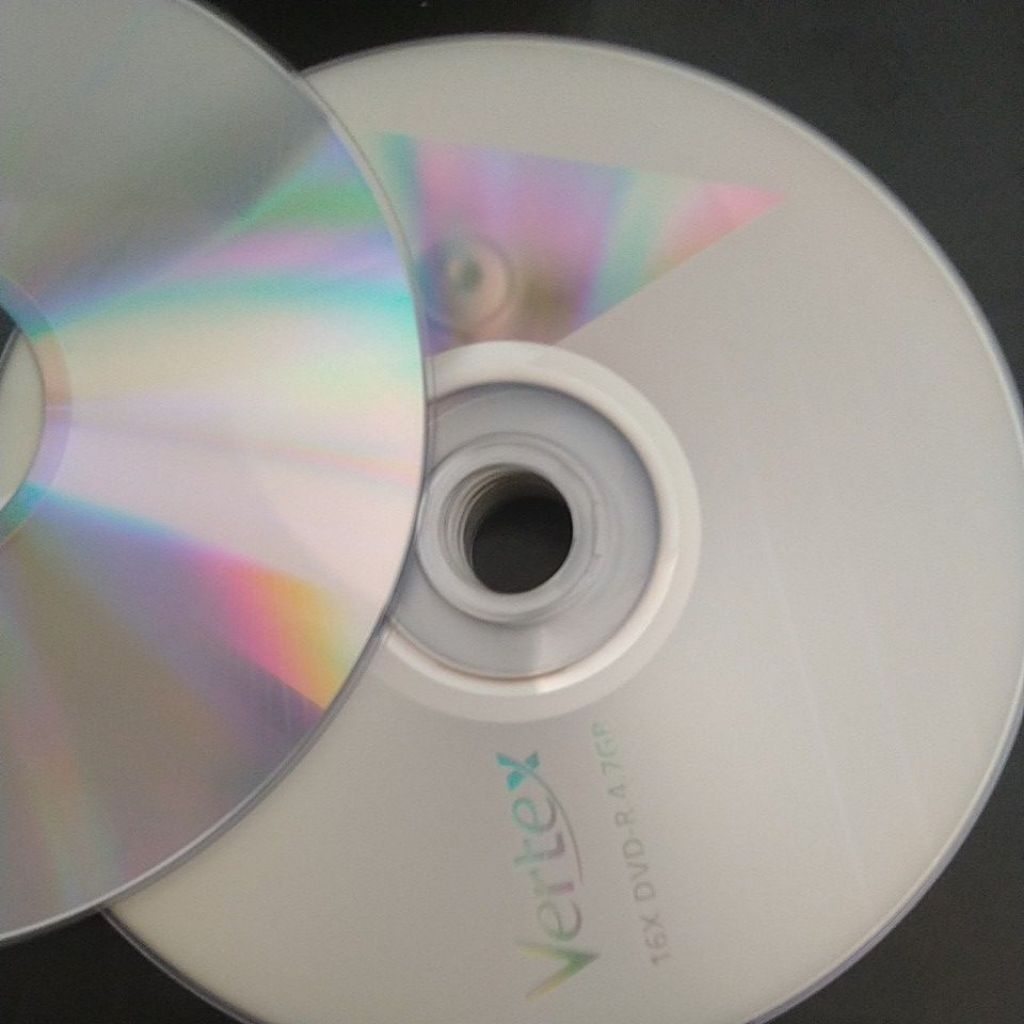 piringan dvd bekas merek vertex arita