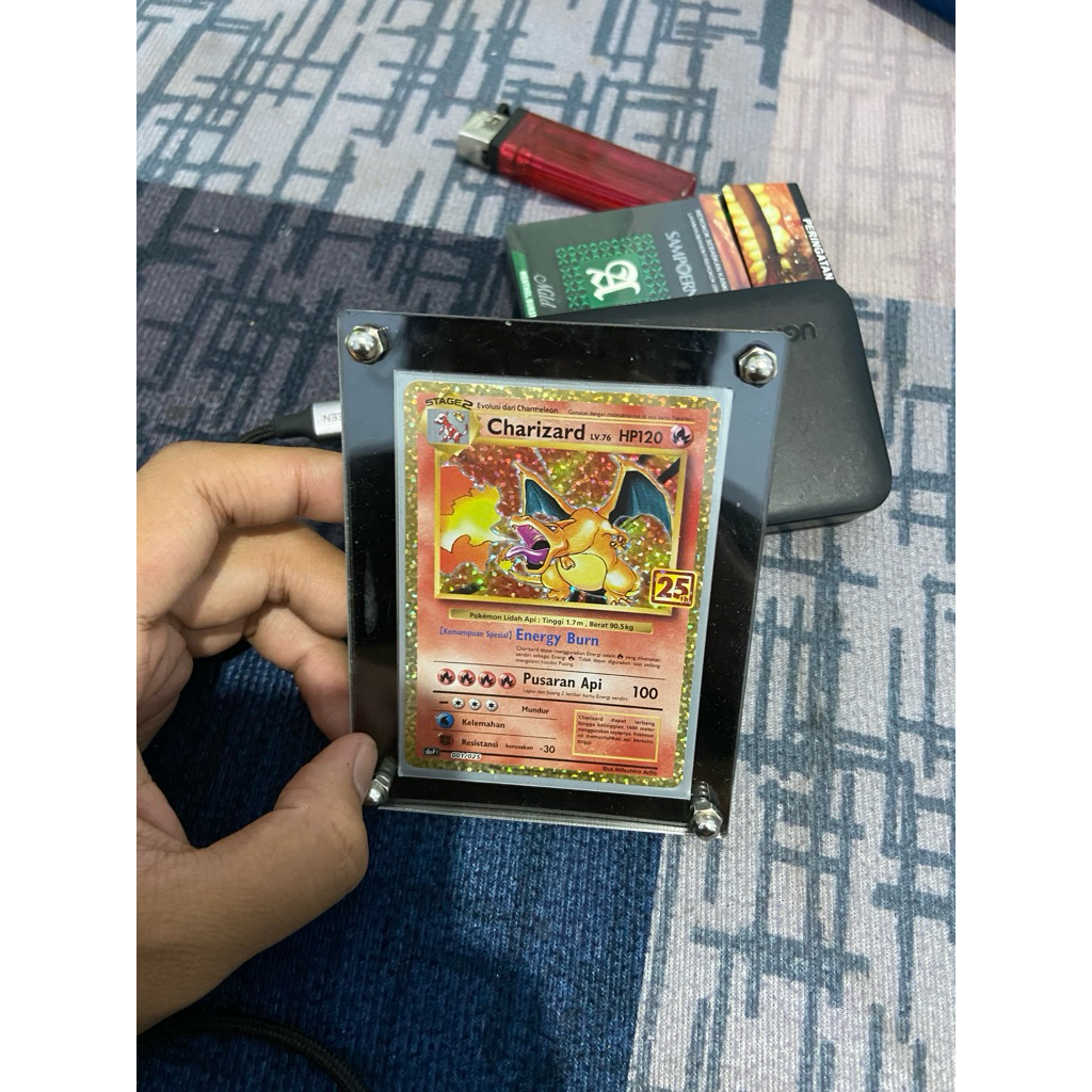 kartu pokemon charizard 25th anniversary