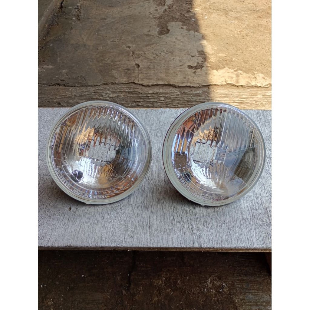 Headlamp H4 5 3/4 Hella Austria