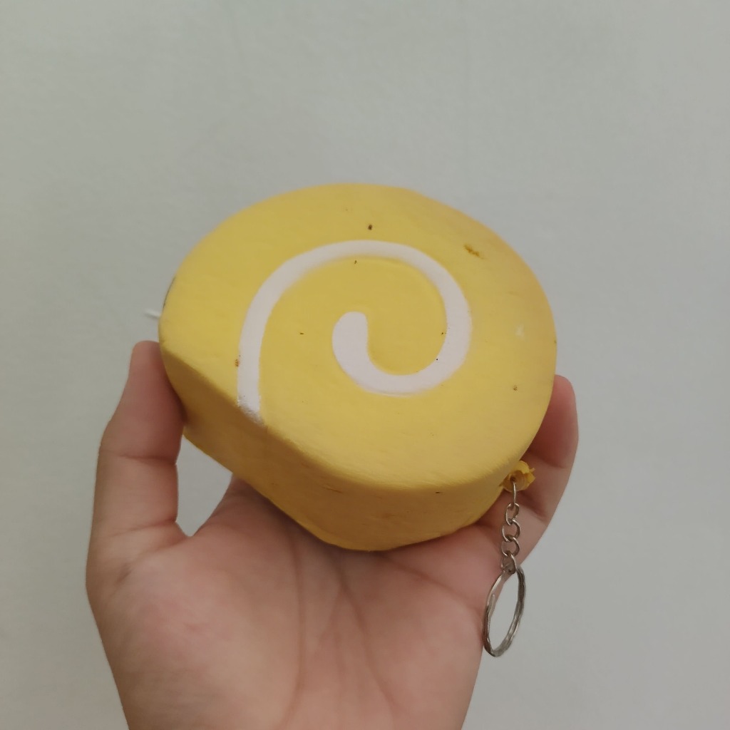 Squishy Roll Cake Kuning Lucu Lembut Slow & Scented - Preloved Terawat (AVCDA004)