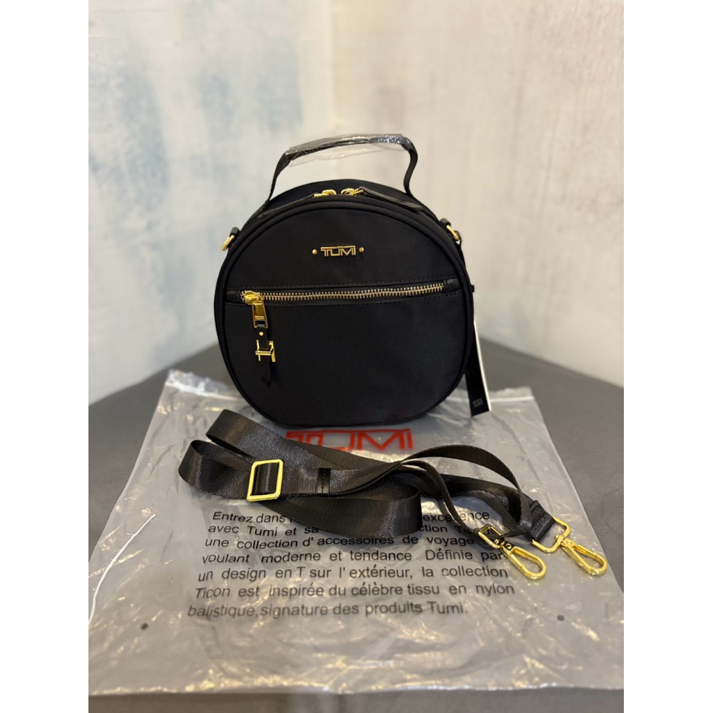 Tumi voyageur quinn crossbody bag/round bag/tas selempang bulat