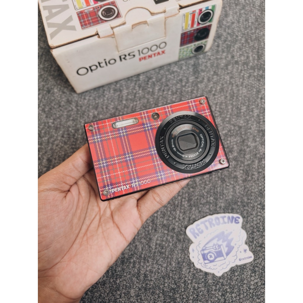 Digicam Kamera Pocket Digital Pentax Optio RS 1000 in tartan red