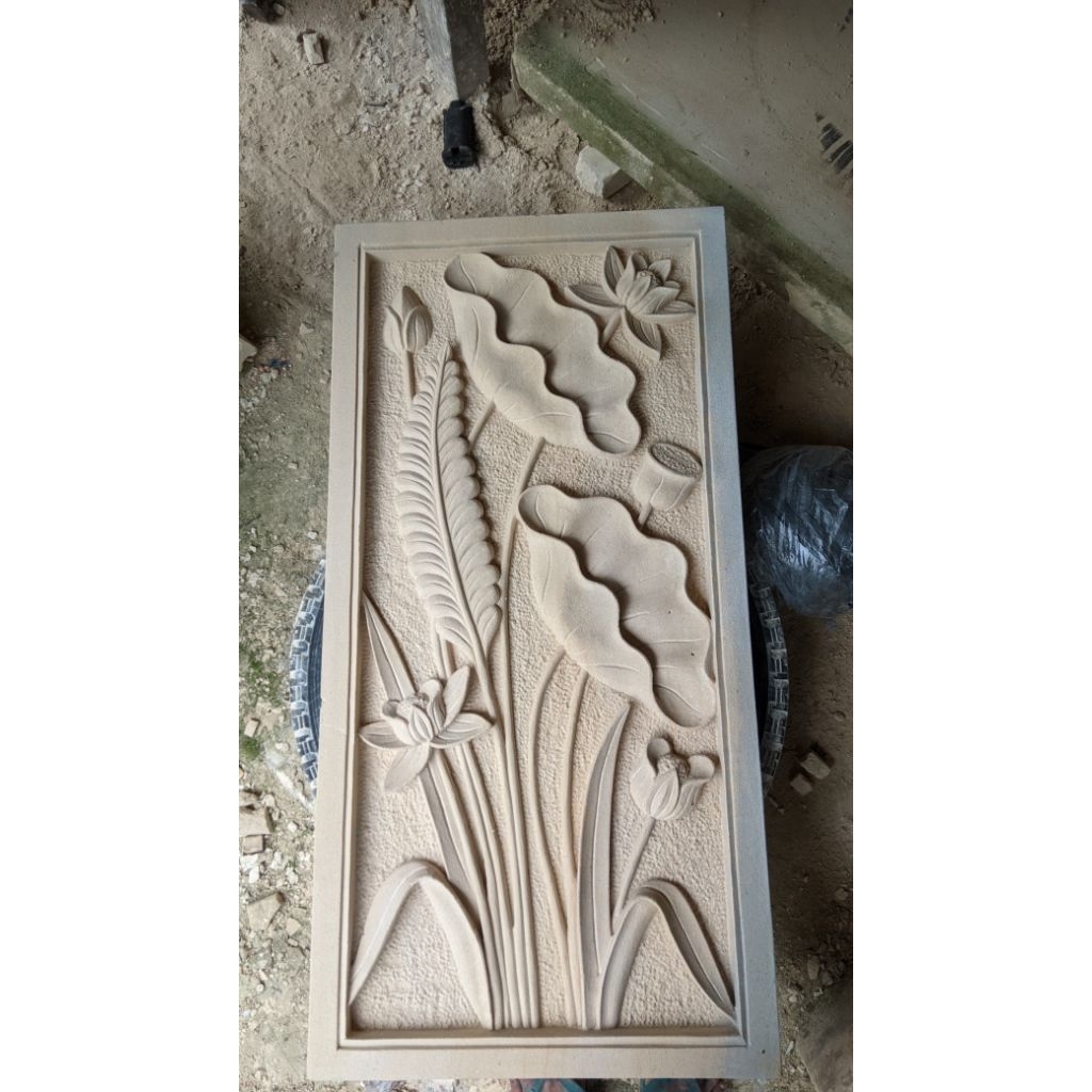 relief tunbuhan batu paras jogja