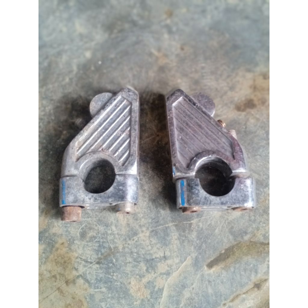 raizer peninggi pemaju stang motor
