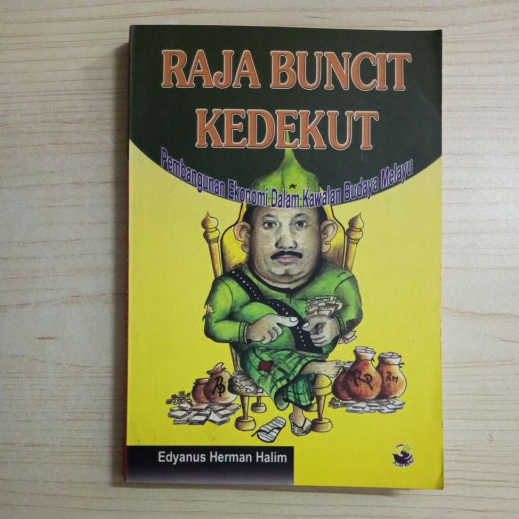 BUKU RAJA BUNCIT KEDEKUT PEMBANGUNAN EKONOMI DALAM KAWALAN BUDAYA MELAYU OLEH EDYANUS HERMAN HALIM