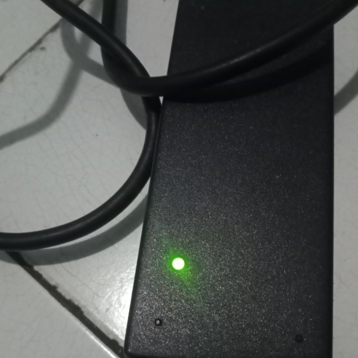 charger laptop Asus (bekas pakai normal)