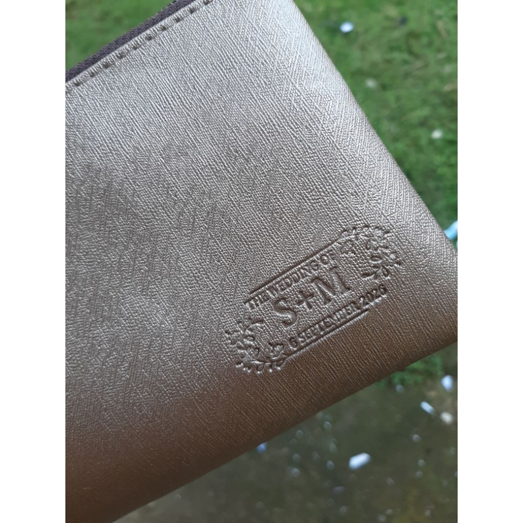 souvenir pouch dengan emboss