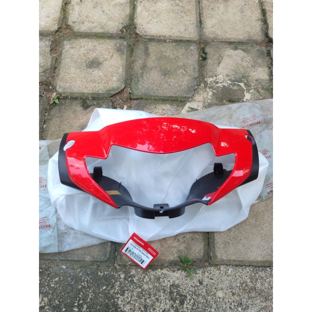 BATOK TOTOK LAMPU DEPAN SUPRA X 125 TROMOL WARNA MERAH. 53205-KTM-860FMV