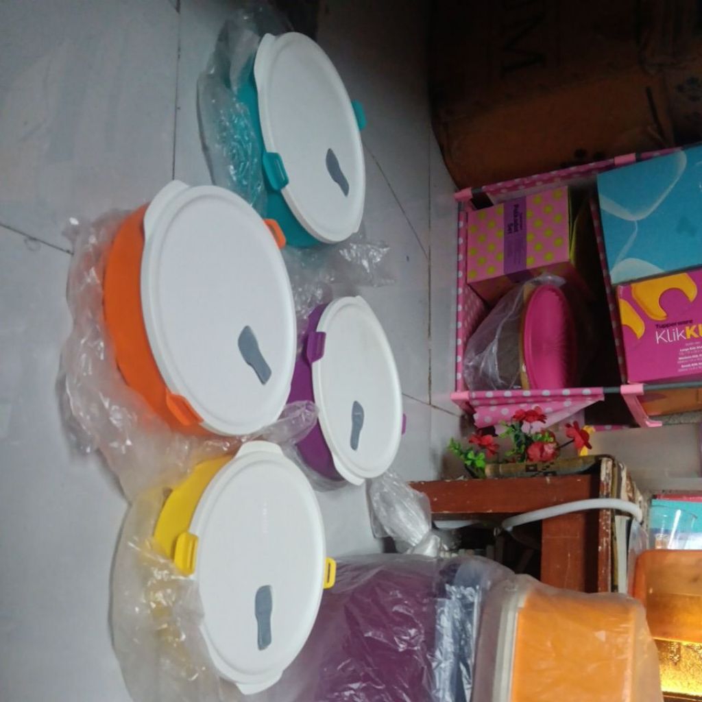 click to go round tupperware