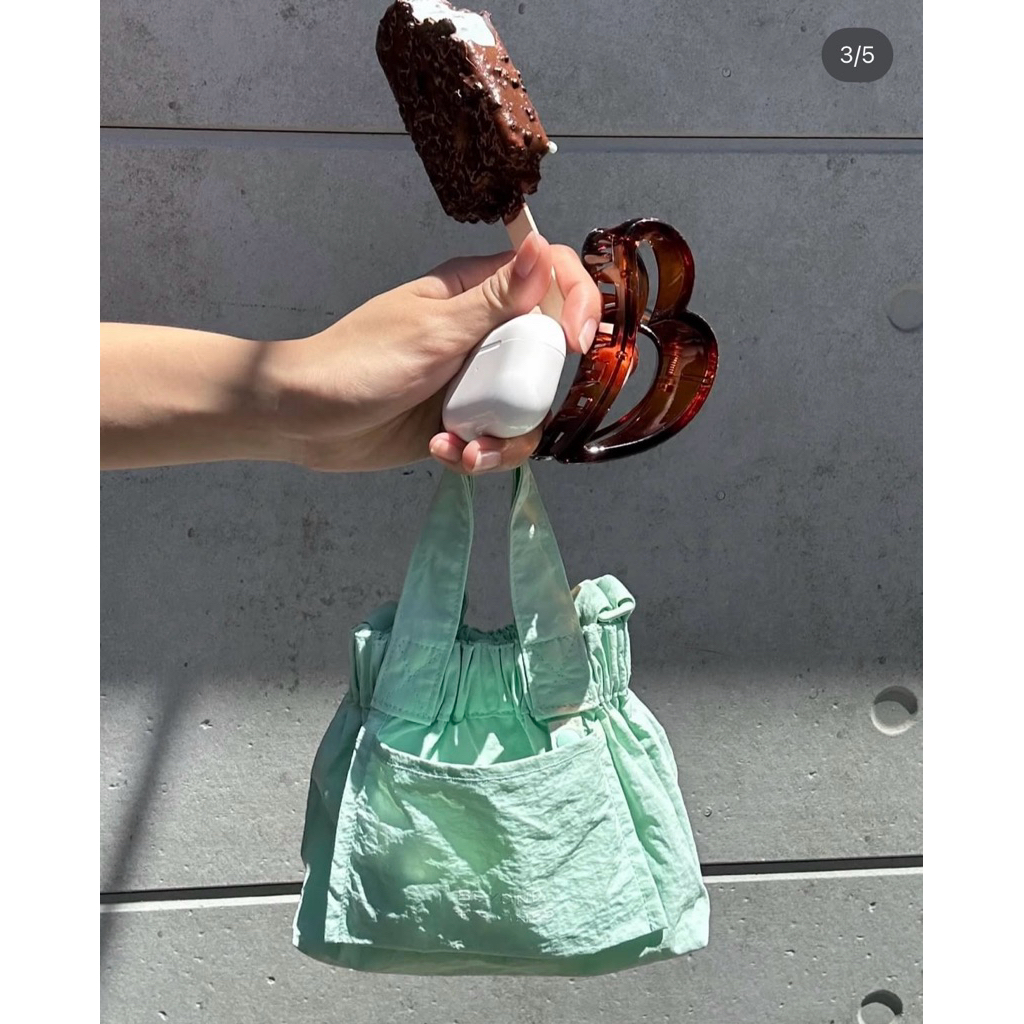 SALE Preloved BTV micro sling bag mint ORI