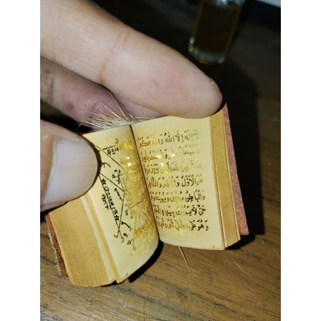 buku kitab andarun tinta warna emas wadah kain