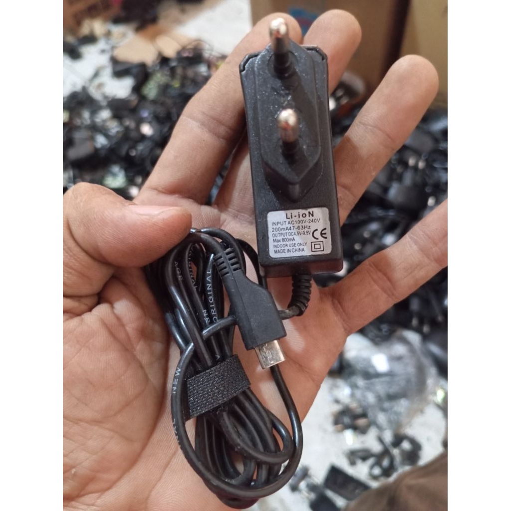 charger/adaptor 4.5v/9.5v 800ma merk li-ion