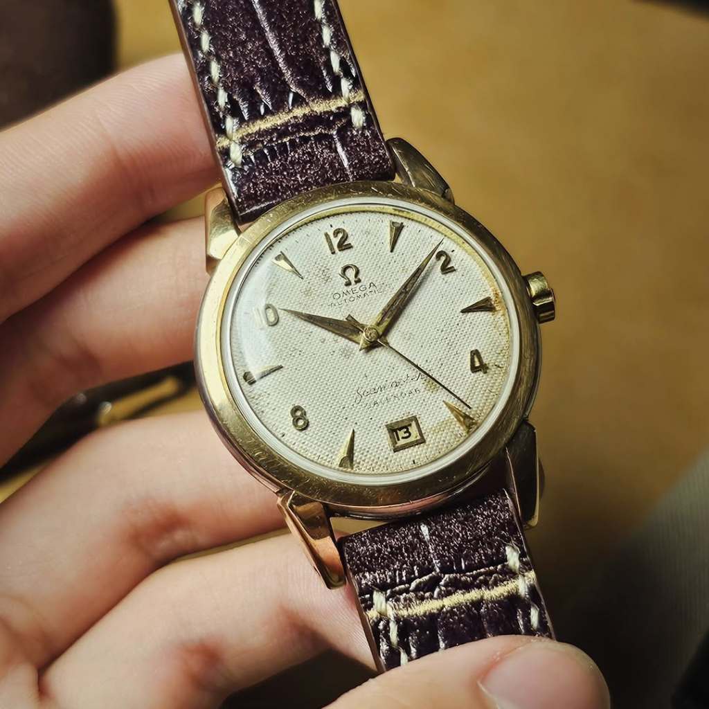 Vintage rare 1950s gold top omega seamaster calendar bumper automatic hobnail dial
