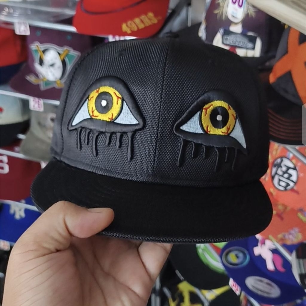 Topi New Era x Jeremy Scott