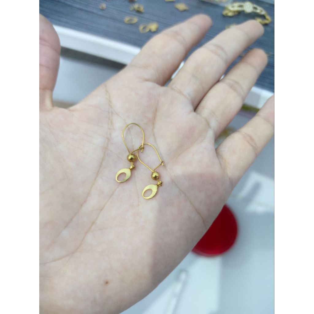 anting titanium asli