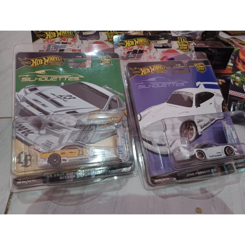 Hotwheels paket hemat Nissan r34 dan RWB free protector mattel