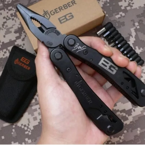 EDC Alat Survival Multifungsi Tang Obeng Pisau Gunting dll dengan tas pinggang untuk keadaan darurat kemping hiking Bear Grylls Multifunctional EDC Plier Survival Tool Multi Tool Folding Knife EDC Multitools Combo Clamps Stain Multifunctional