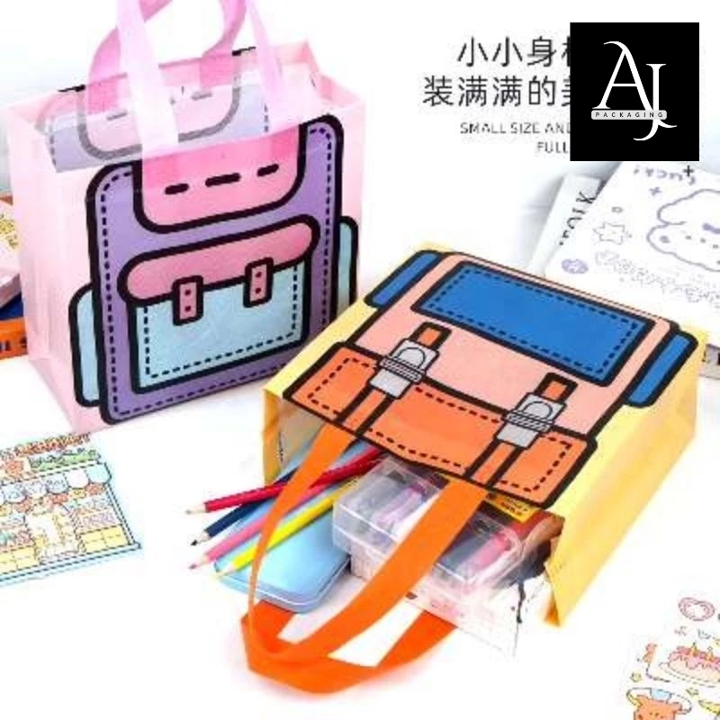 

Tas goodiebag ultah anak non woven motif tas sekolah lucu / Kantung goodiebag souvenir gift sekolah anak