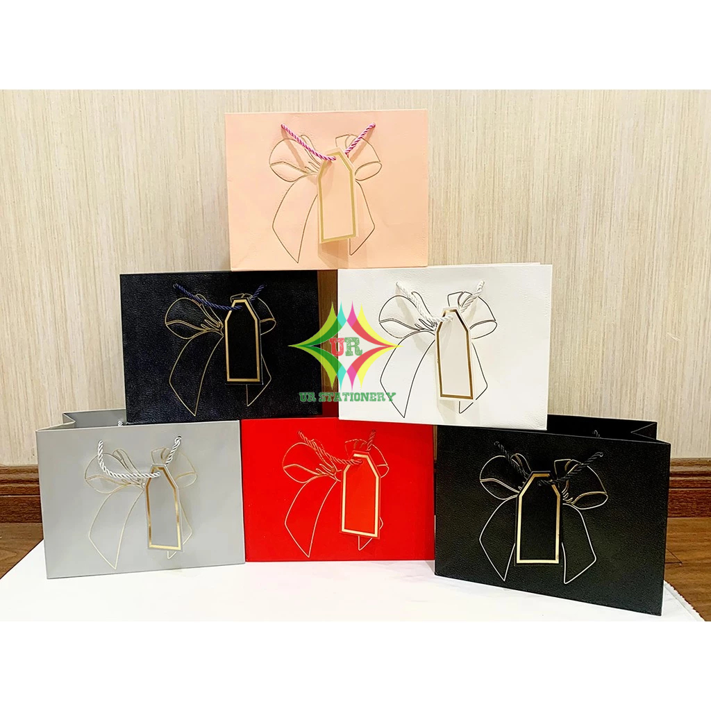 

PAPER BAG TALI MOTIF PITA LIST EMAS /Tas Souvenir/Gooldie Bag