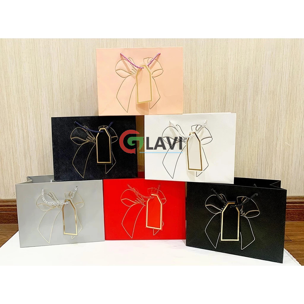 

PAPER BAG TALI MOTIF PITA LIST EMAS /Tas Souvenir/ Gooldie Bag