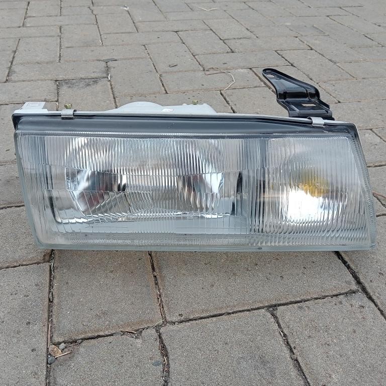 Headlamp Isuzu Gemini merk TYC