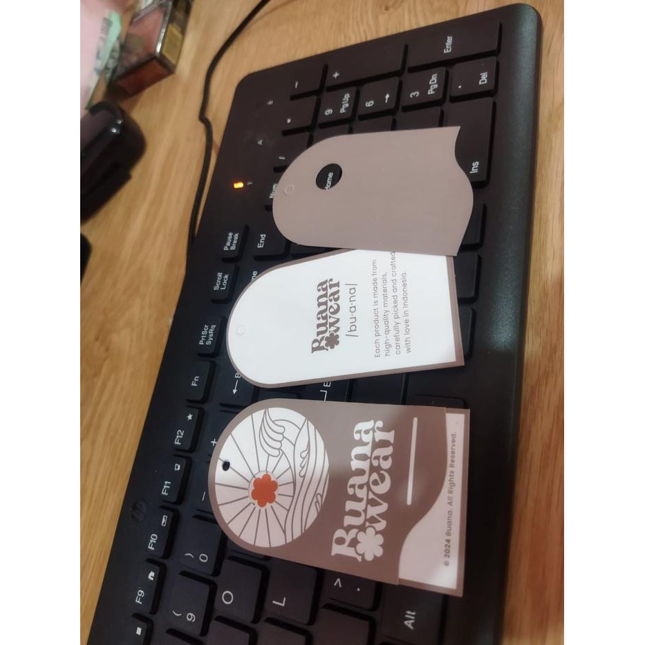 

Hangtag custom kertas ivory 2 design 1000 lusin