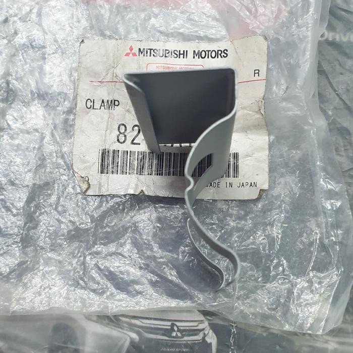 Braket Nozzle Headlamp Washer Asli Mitsubishi Pajero Sport