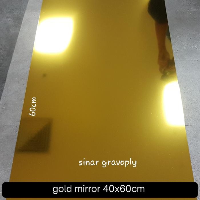 

Gravoply gold mirror teks hitam 40x60cm tebal1.5mm