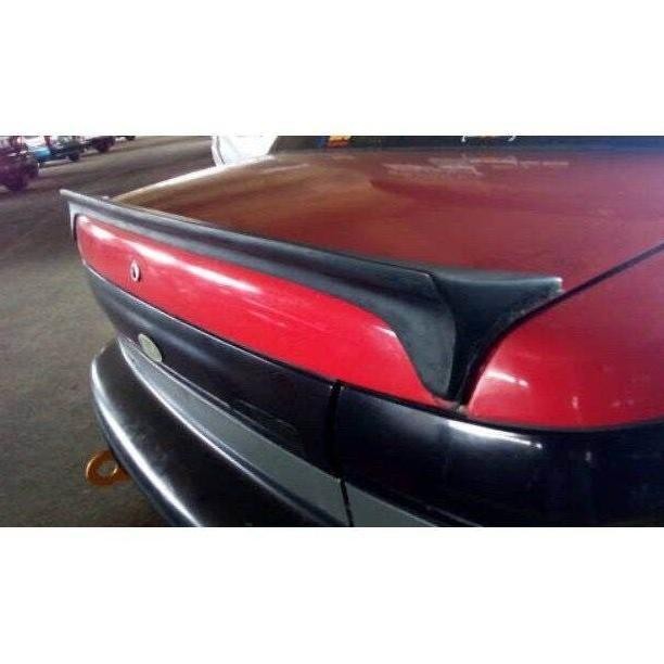 ductail dan topi kaca mobil timor