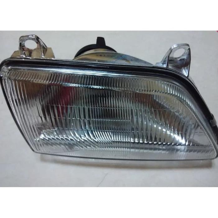 Terhemat Headlamp Soluna 1997 Tyc Sepasang