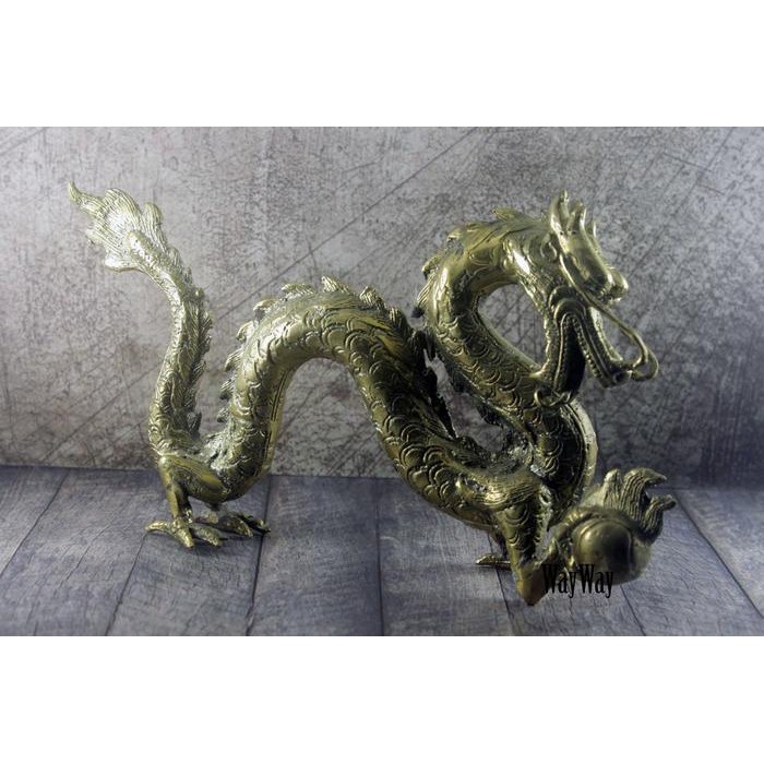 Naga Bola Kuningan Sari Patung