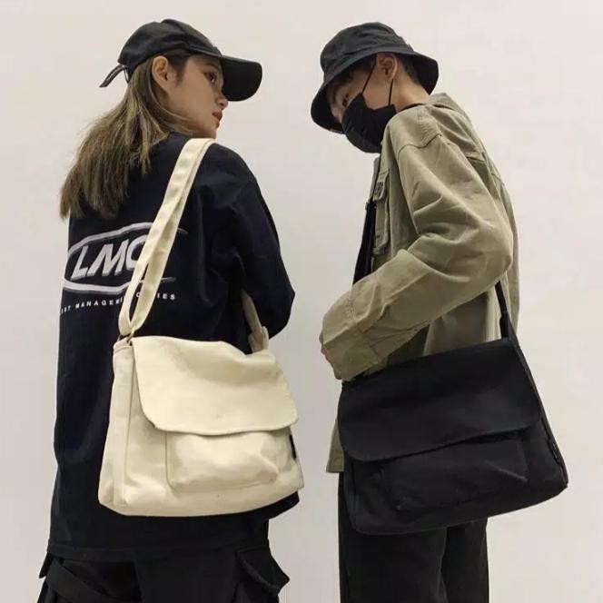 

QF985 4 WARNA TAS SELEMPANG CANVAS SUEDING PRIA WANITA BOOM SALE