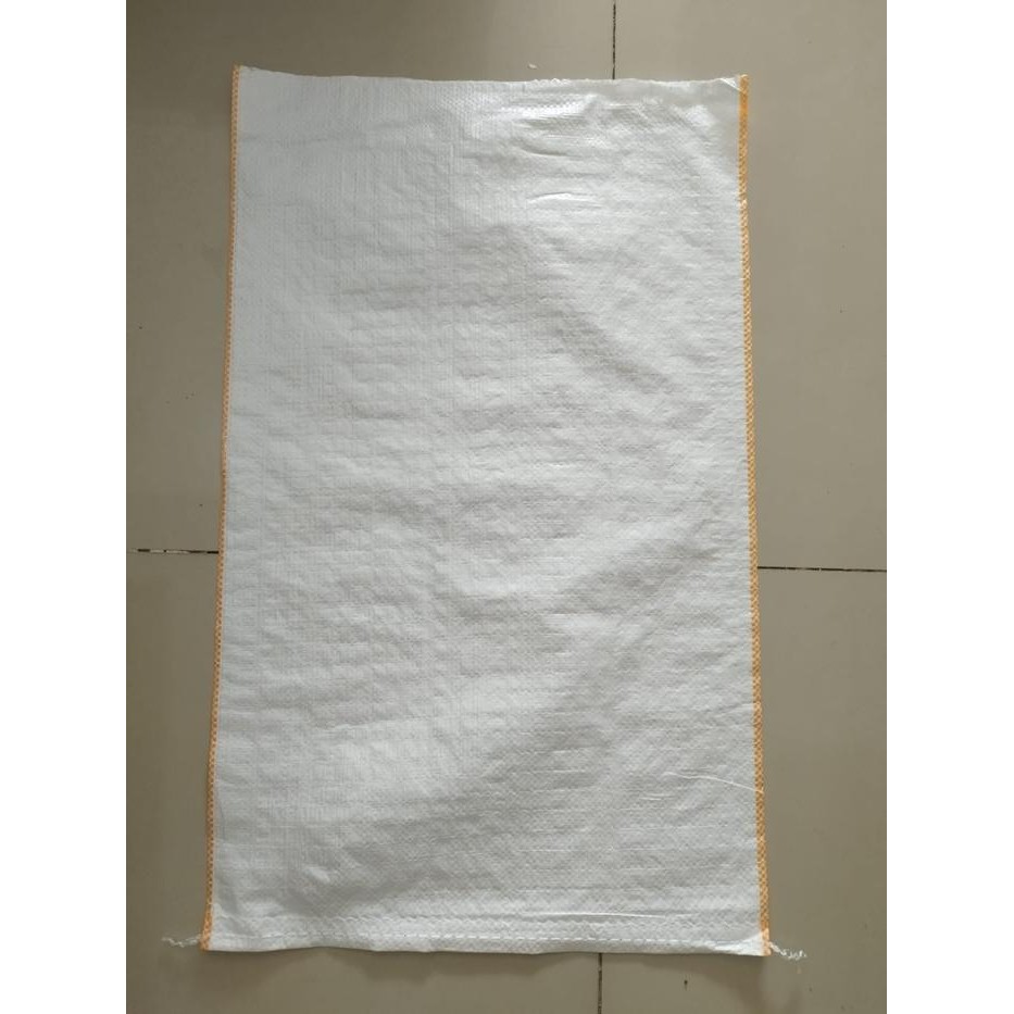 

(PAKET ISI 10) KARUNG PLASTIK UNTUK ISI 25 KG "45X75 CM" PUTIH DOFF LIST OREN MINIMAL ORDER 5