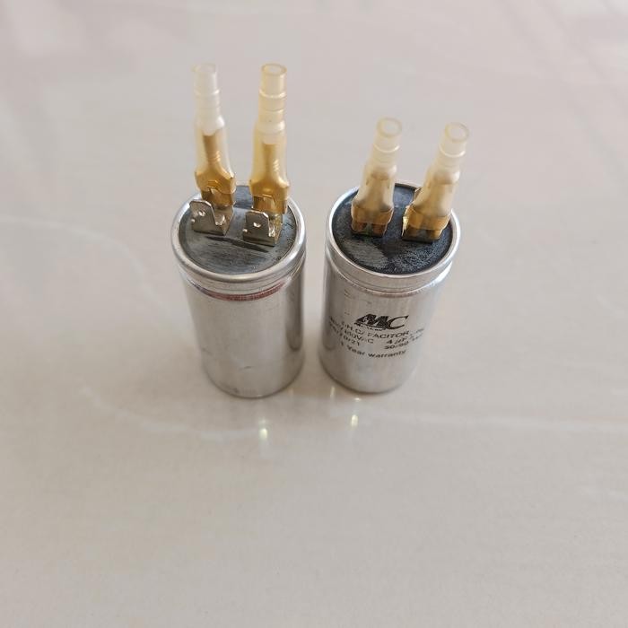 kapasitor 4 uf 400/450 v dan 5 uf 400/450 v ac